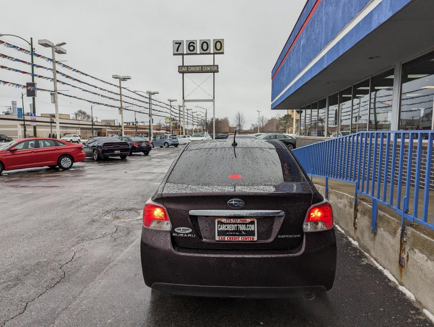 2013 BURGUNDY Subaru Impreza Limited 4-Door+S/R+NAVI (JF1GJAK67DH) with an 2.0L H4 DOHC 16V engine, Continuously Variable Transmission transmission, located at 7600 S Western Ave., Chicago, IL, 60620, (773) 918-3980, 0.000000, 0.000000 - Photo#3